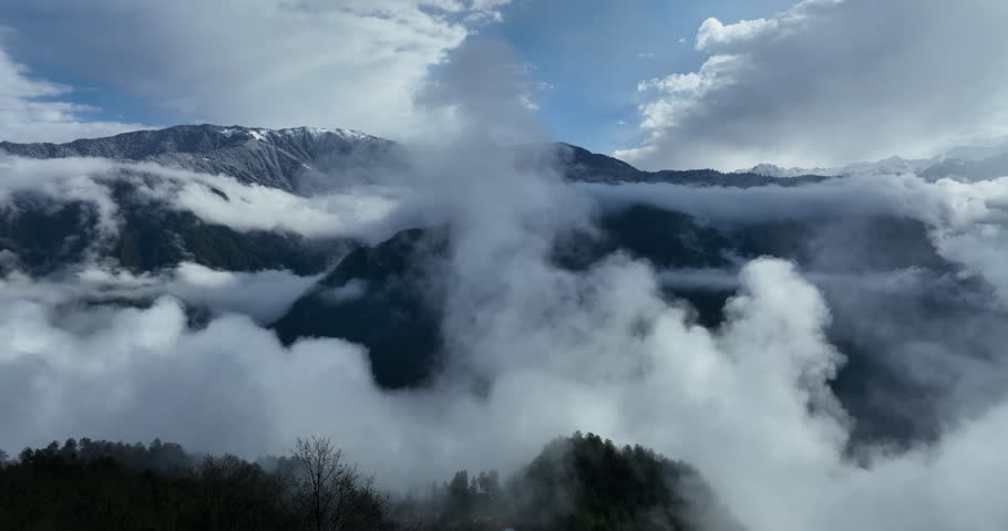 Beautiful foggy high altitude mountain landscape in China	