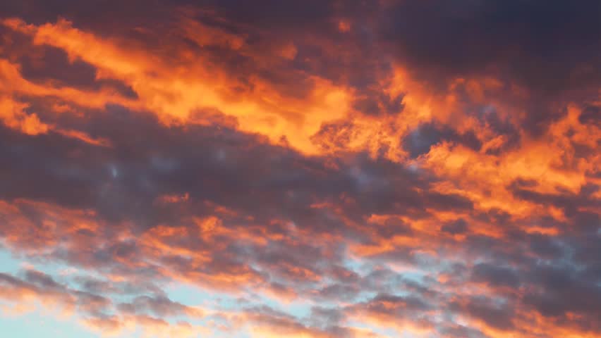 Fiery Clouds at Sunset - Timelapse