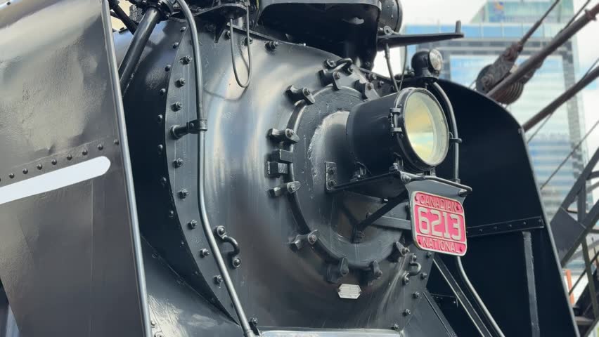 CN 6213 Steam engine in toronto at roundhouse park with cn tower behind