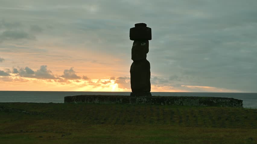 Time lapse at sunset over Ahu Ko Te Riku with moai statue in Rapa Nui, Easter Island, Chile