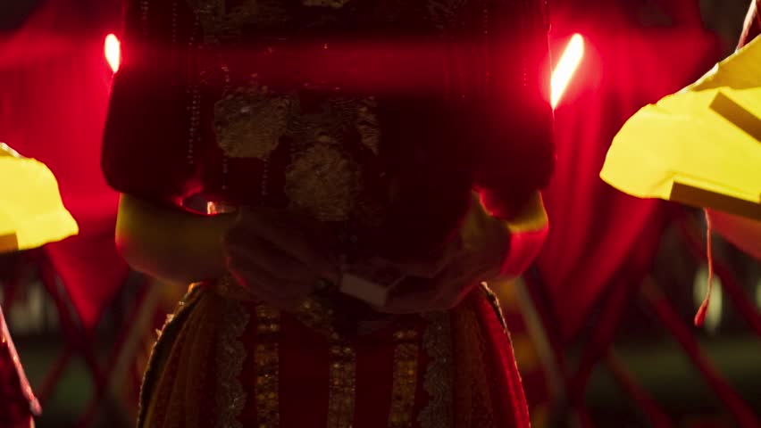 Close-Up of a Bugis Fire Dancer