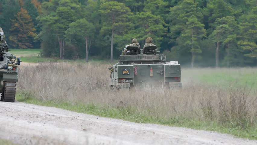 British army Warrior FV510 IFV in action on a military exercise