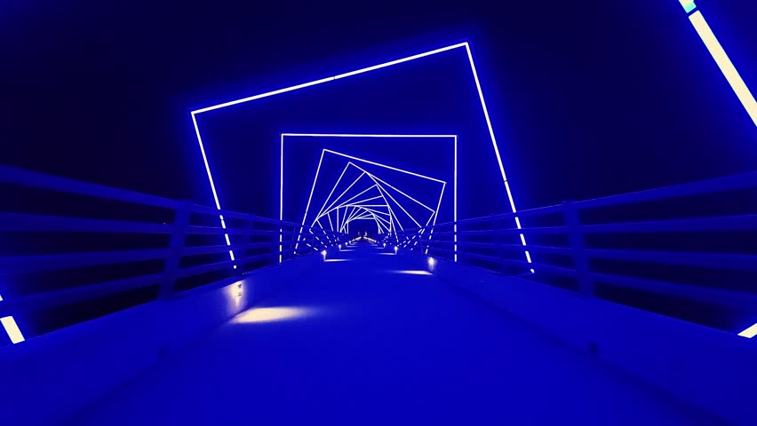 Vivid nighttime view of the illuminated High Trestle Trail Bridge in Iowa.