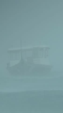 Ferry Battling Heavy Rain And Fog, Captain Steers Through Reduced Visibility While Crew Secures Deck, Distant Cruise Ship Looms In Mist As Waves Crash And Horizon Blurs Into Gray Moody Cinematic