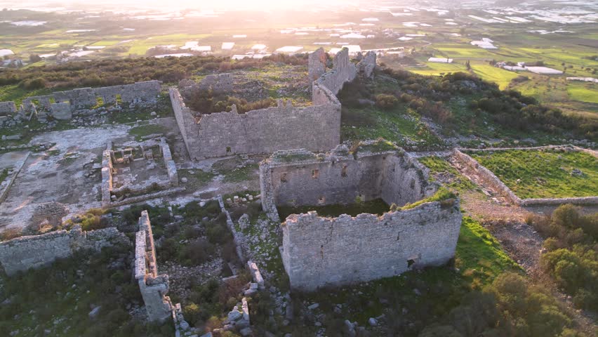 Spring views of Sillyon Ancient City in Antalya, Türkiye, featuring ancient ruins, stone architecture and archaeological heritage.