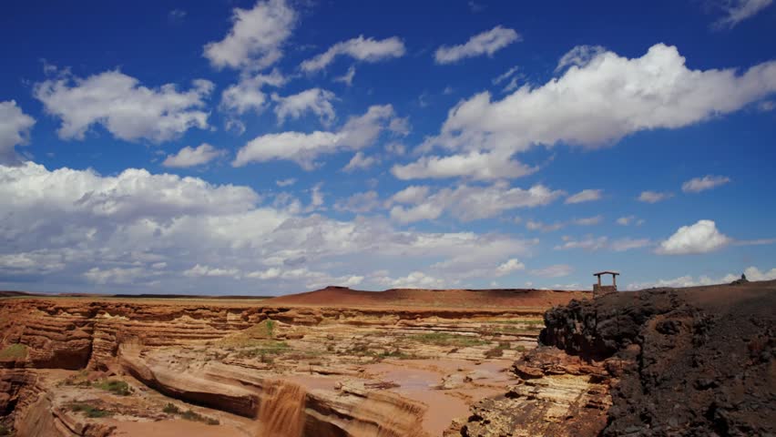 Pan and tilt shot of Grand Falls, Arizona from the nearby parking lot.