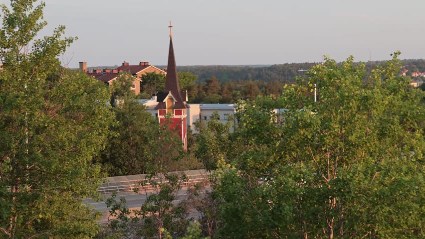 Stockholm, Sweden A sunrise over the elevated Essingeleden and E4 highway and the S:t Sigfrids kyrka. 