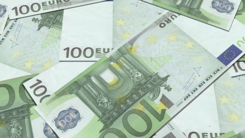 100 euro banknotes in a row. European Union Currency. Stack of 100 euro