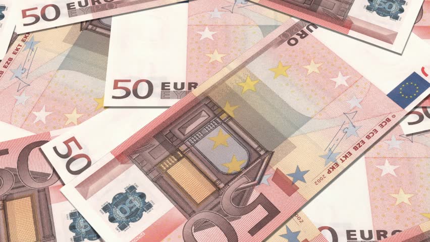 50 euro banknotes in a row. European Union Currency. Stack of 50 euro banknotes.