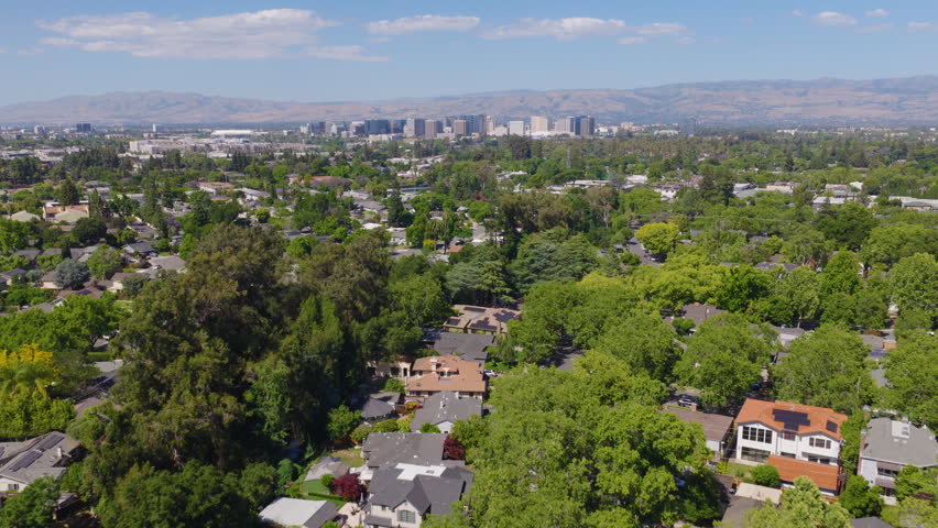 San Jose California Aerial Pullback View of Suburban Homes and Skyline 01