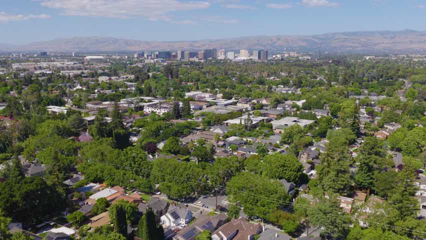 San Jose California Aerial Pullback View of Suburban Homes and Skyline 02