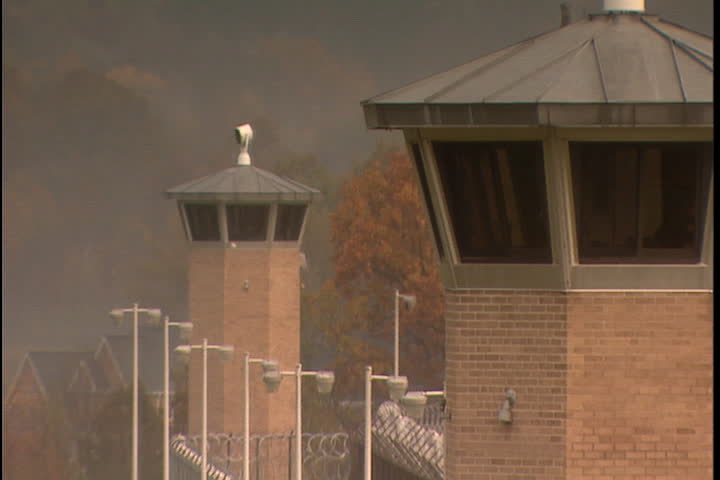 Guard tower and barbed wire perimeter fence at Southern Ohio Correctional Facility in Lucasville, Ohio.
