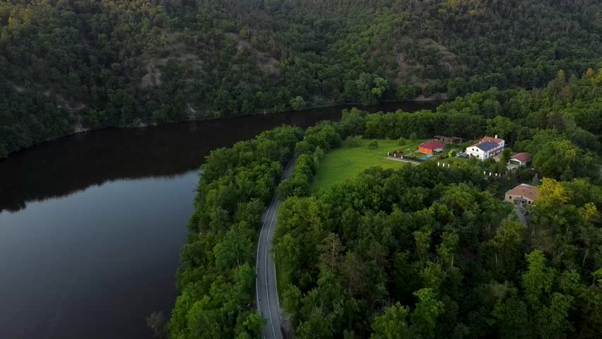 Sunrise Light Over Scenic Reservoir and Wilderness