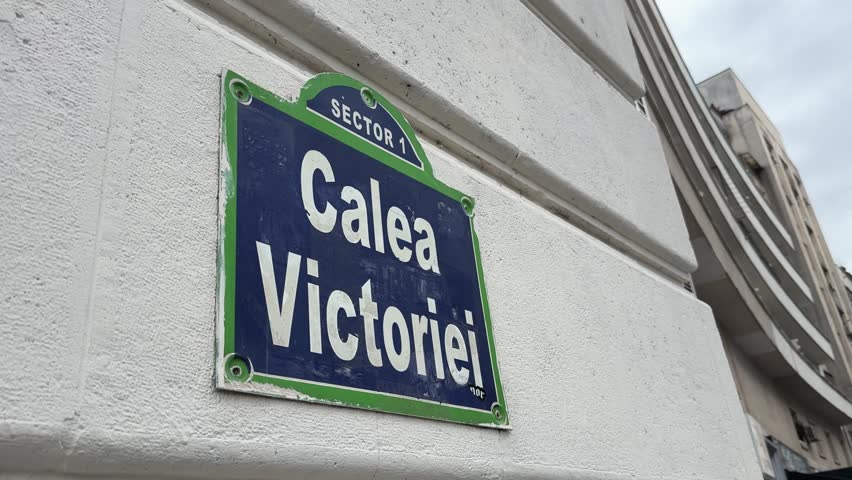 Close-up of the iconic Calea Victoriei street sign, an essential landmark in Bucharest