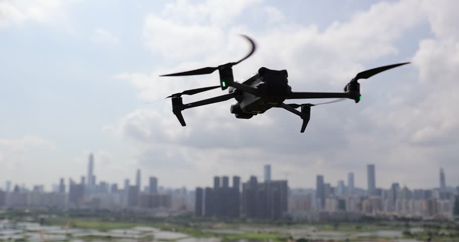 Drone flying in spring city	