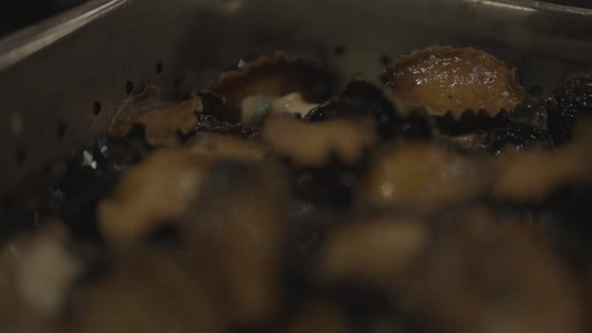 Extreme close-up of tray filled with food in kitchen