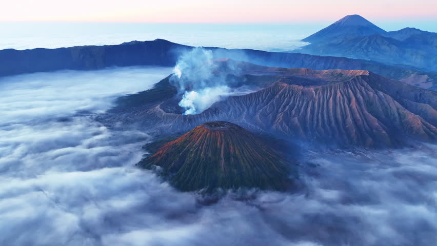 Amazing Mount Bromo volcano during sunrise or sunset sky over Mountains Penanjakan in Bromo Tengger Semeru National Park,East Java,Indonesia,Landscape background