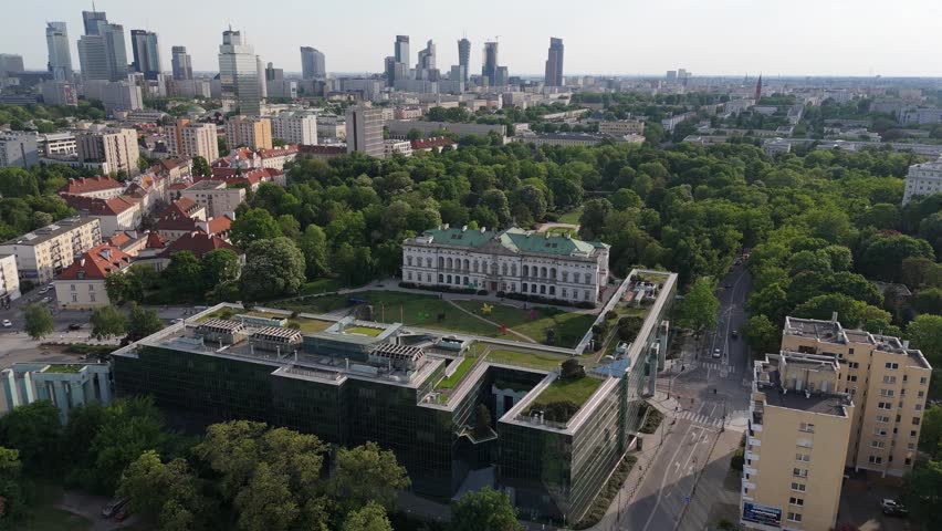 A view of Warsaw’s city centre, looking towards the Krasiński Palace, with the modern Supreme Court building in the background, Warsaw City Hall and the skyscrapers emerging on the left in the very heart of the city on a summer afternoon during the golden hour