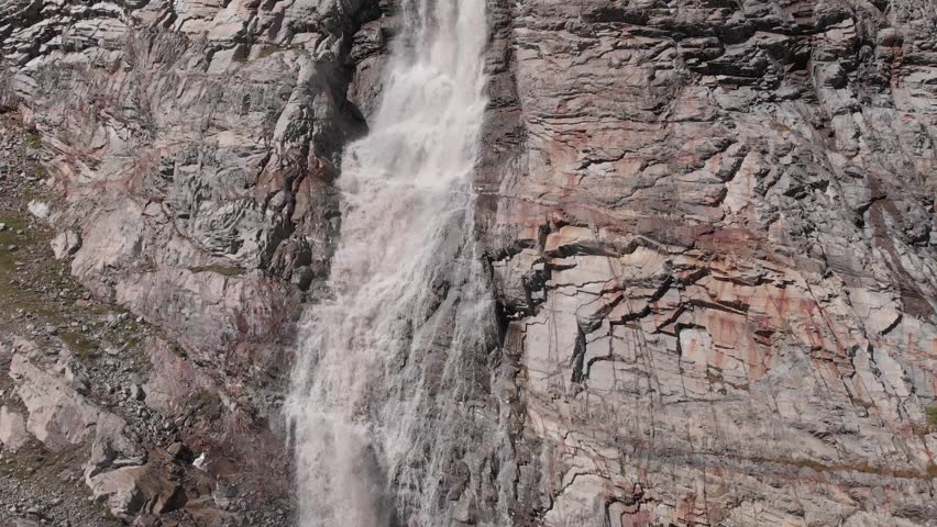 Caucasus, North Ossetia. Adaykom Gorge. Waterfall on the rocks.