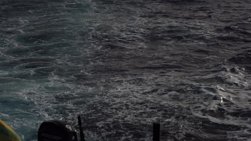 Antarctic expedition. waves rolling behind the boat as it moves through the ocean. Antarctic Peninsula