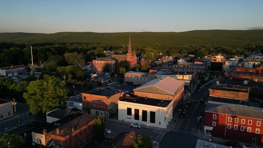 view of port jervis downtown church aerial (small town village new york new jersey pennsylvania tri state line border) delaware river city urban commercial district