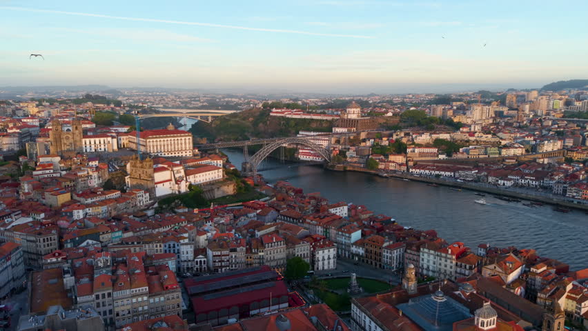 Aerial View of illuminated Porto city. Dom Luis bridge, Portugal