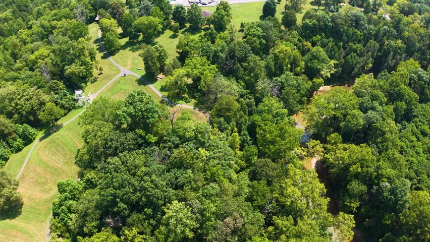 An aerial view of a serpent mound with greenery and paths in Chillicothe, Ohio.