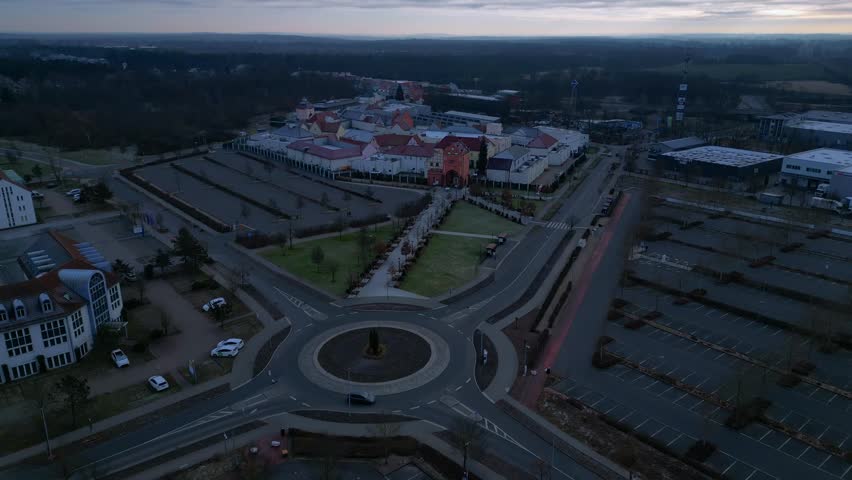 large retail park designer outlet center in winter. Dramatic aerial view drone
