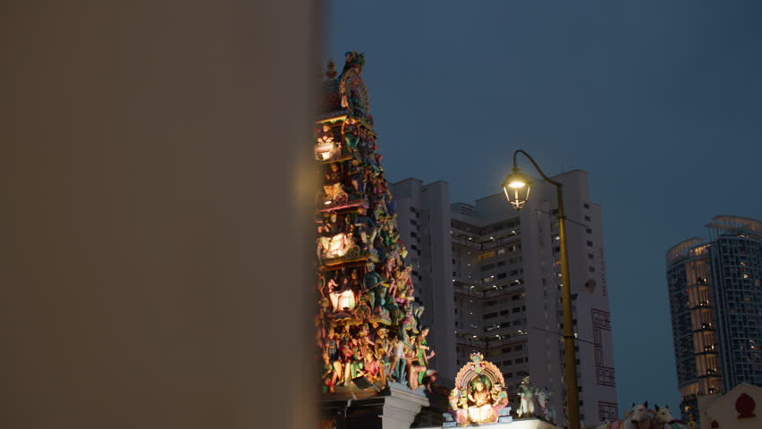 Night cityscape, Indian temple in Singapore city. Beautiful architecture of Chinatown, travel and tourism in Asia