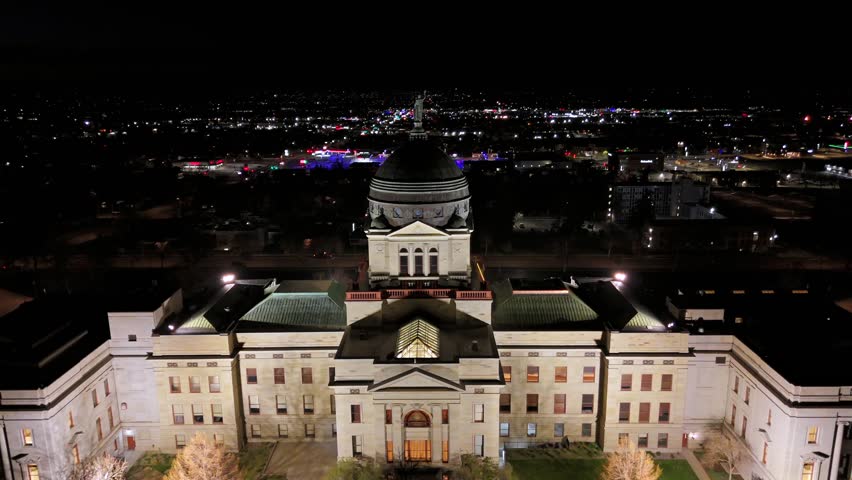 Montana State Capitol Night Pullback With Dome And City Lights