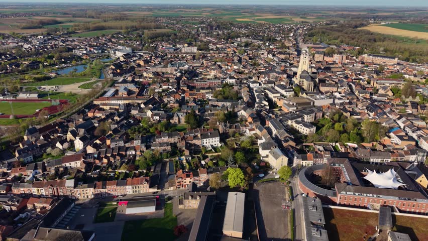 Aerial panoramic view above the city Tongeren-Borgloon beside the old town on a sunny morning  in Belgium.