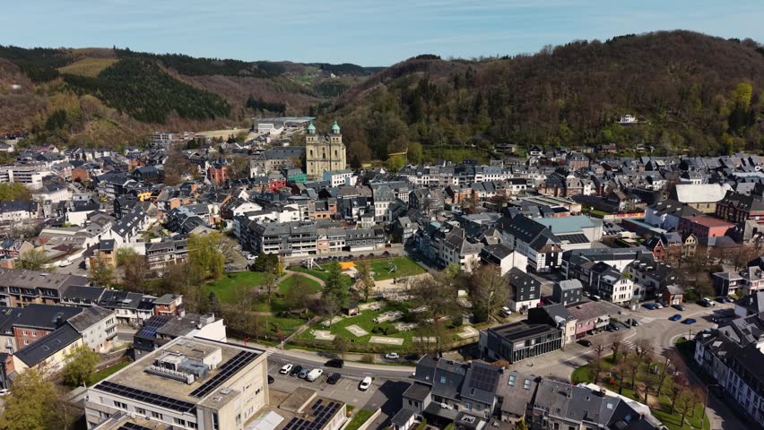 Aerial panoramic view above the city Malmedy beside the old town on a sunny noon  in Belgium.