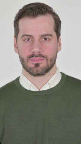Portrait of Man showing Thumbs Up Sign , White Screen, Vertical Video