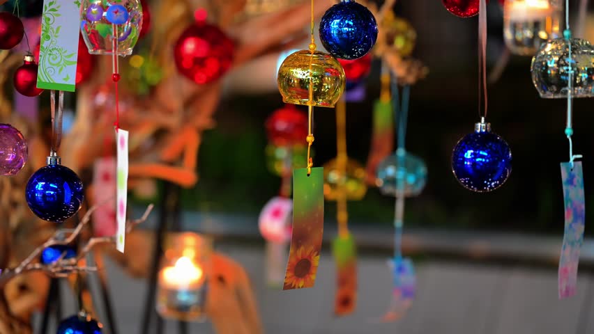 Candle Lantern and Glass Wind Chime Display