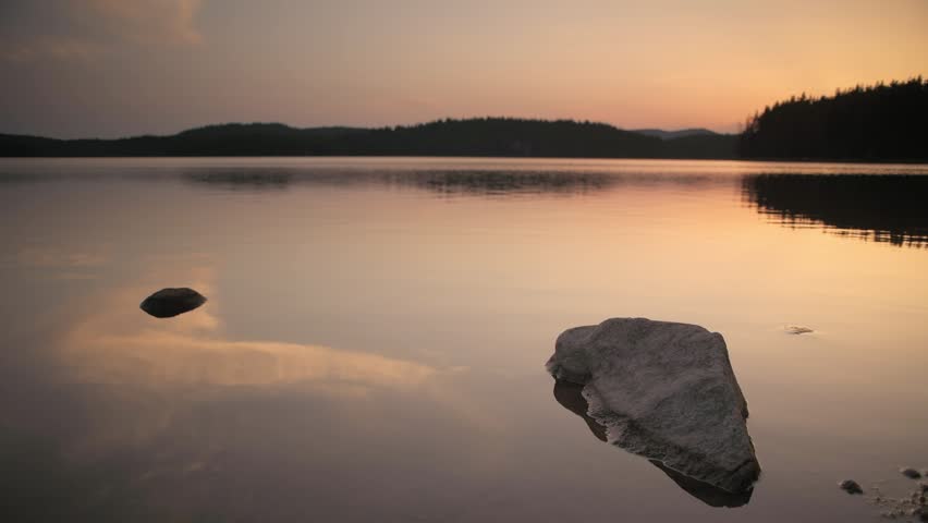 Beautiful sunset over Shiroka polyana dam (Wide meadow), Rodopi mountain, Bulgaria.