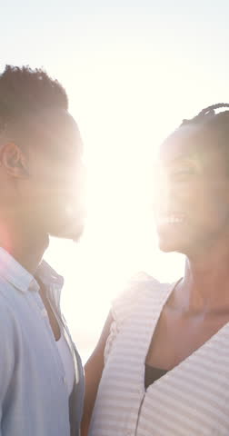 Face, beach and hug with black couple for love, romance and honeymoon celebration or travel. Portrait, embrace and man with woman for happiness, marriage and seaside with relationship and smile