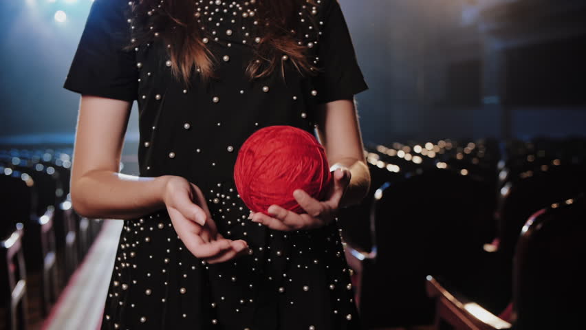 Woman in Holding Red Yarn Ball. Fashion Design Concept