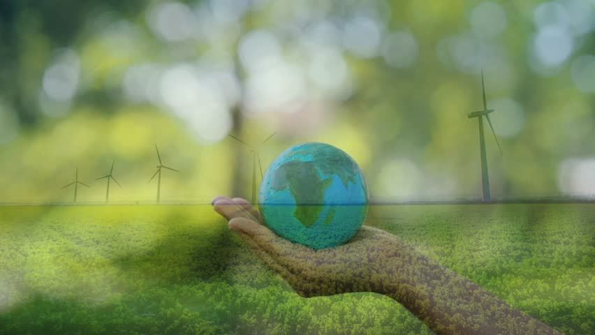 Cupped hands holding a small earth globe overlaid on a lush green field with wind turbines. Conveys a message of nurturing nature through sustainable wind energy.