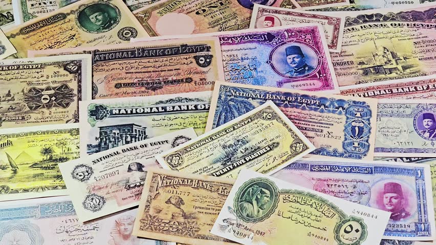 a collection of rare, vintage Egyptian banknotes, from the late 19th and early 20th centuries, old vintage retro Egyptian cash money banknotes at the era of the kingdom of Egypt and Sudan