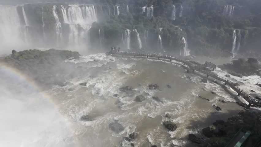 River bridge and waterfall landscape viewed from elevated observation point footage