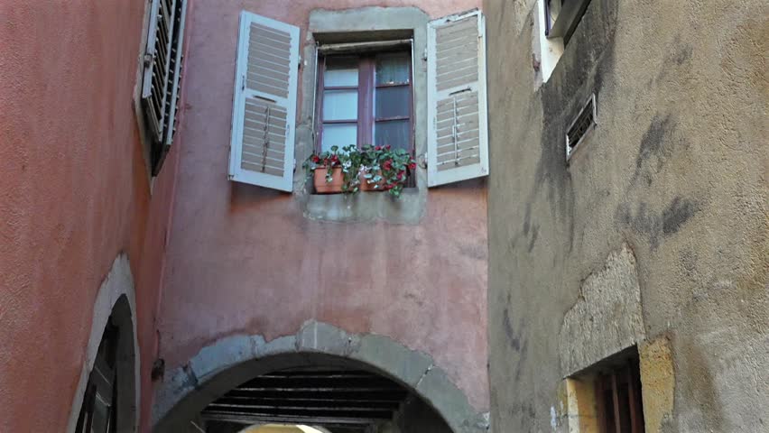 Close upward view of narrow old town alley in Annecy France