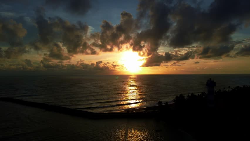 beach sun set  cloudily  drone 
