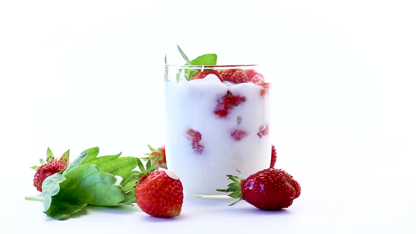 Fresh strawberry yogurt dessert isolated on white background .