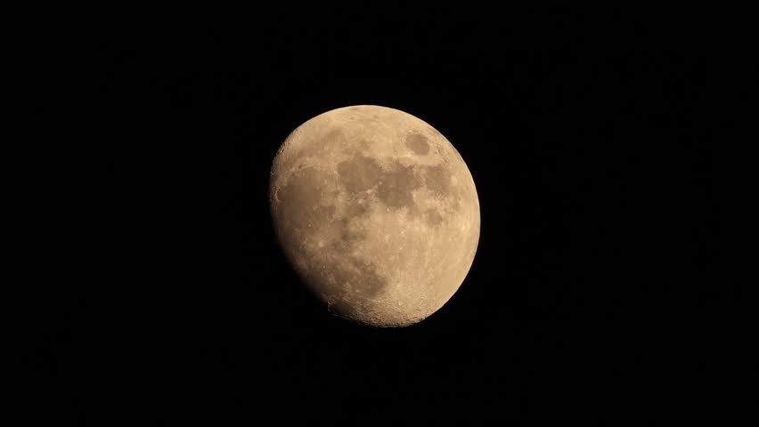 full moon disappears among the clouds