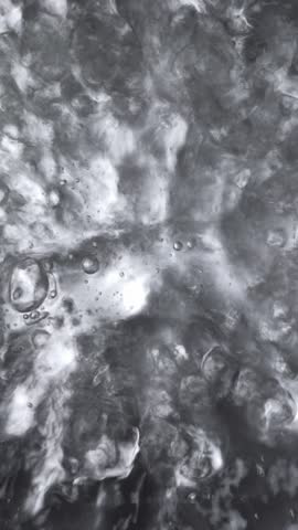 Boiling water in saucepan. Process of cooking food. Vertical footage