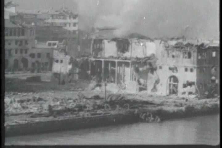 1940s - U.S. soldiers fight to take Manila in the Philippines in World War II.