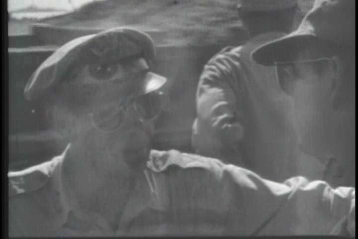 1940s - Philippines residents and troops greet American troops with open arms in World War II.