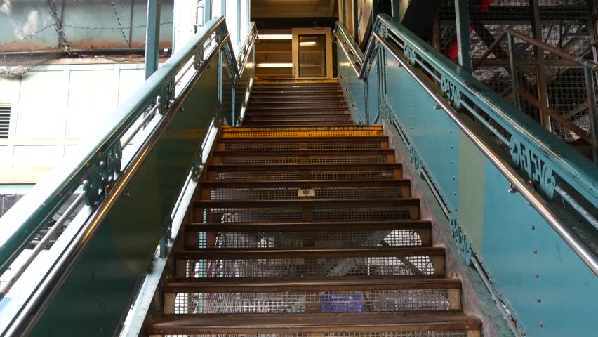 New York City 125 street elevated subway metro entrance in Harlem, United States. American passenger transport, Upper Manhattan. Metropolitan station in NYC USA. Historic architecture, metallic bridge