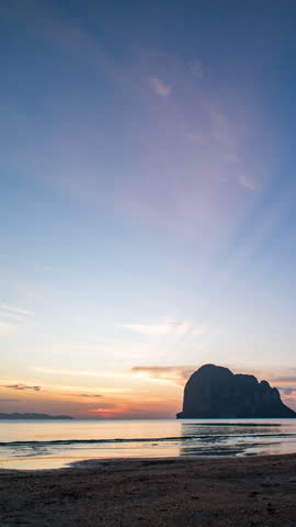 Time-lapse of late evening sky over an exotic beach, transitioning from dusk to darkness in Thailand.