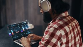 Male IT specialist in headset developing software on holographic laptop display - Powered by Shutterstock - Get 15% off with code: PIKWIZARD15